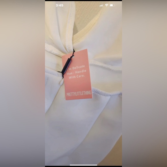 PRETTY LITTLE THING White Bardot Flared Leg Bonded Scuba Jumpsuit - Picture 4 of 7